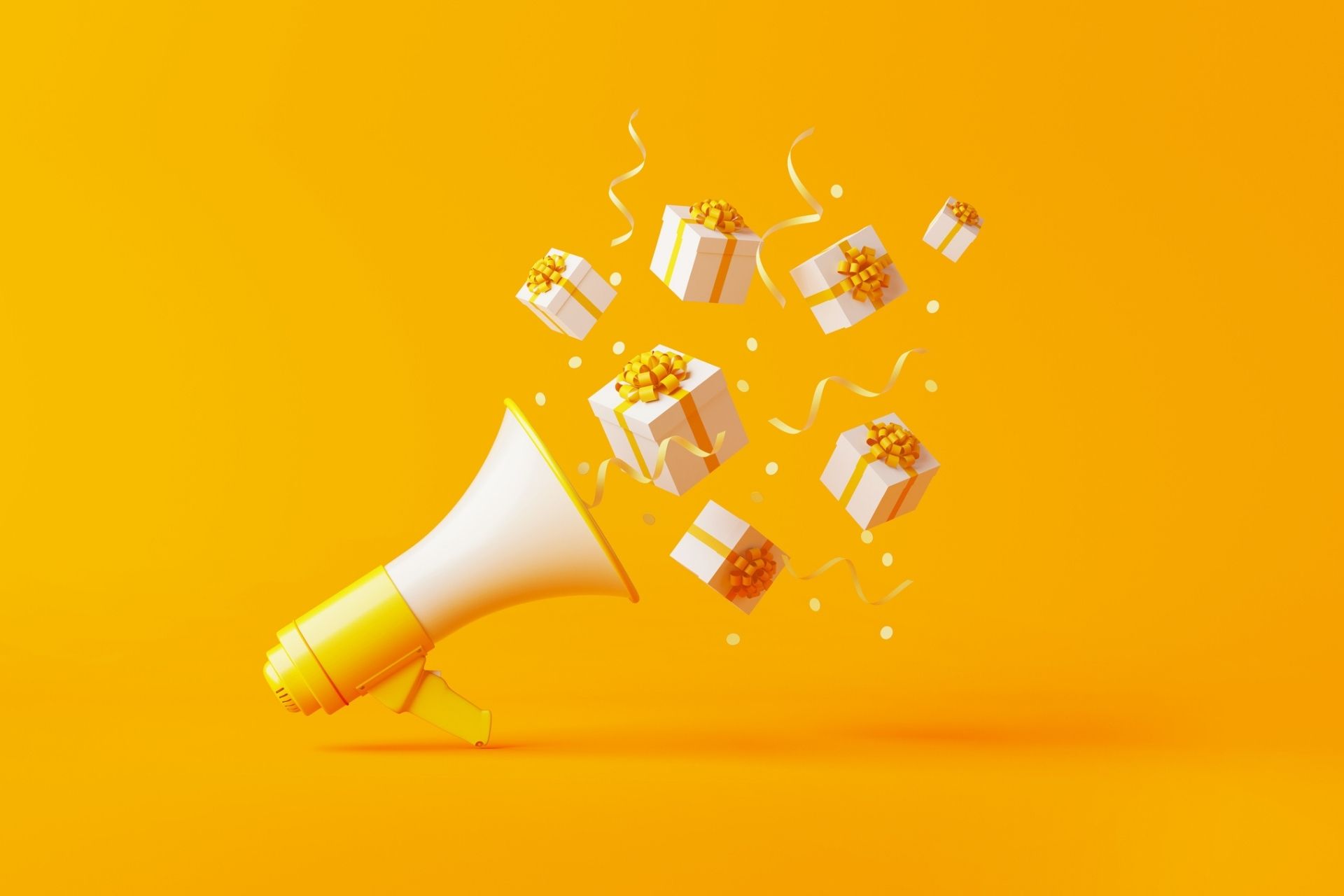 Yellow background with megaphone and gifts